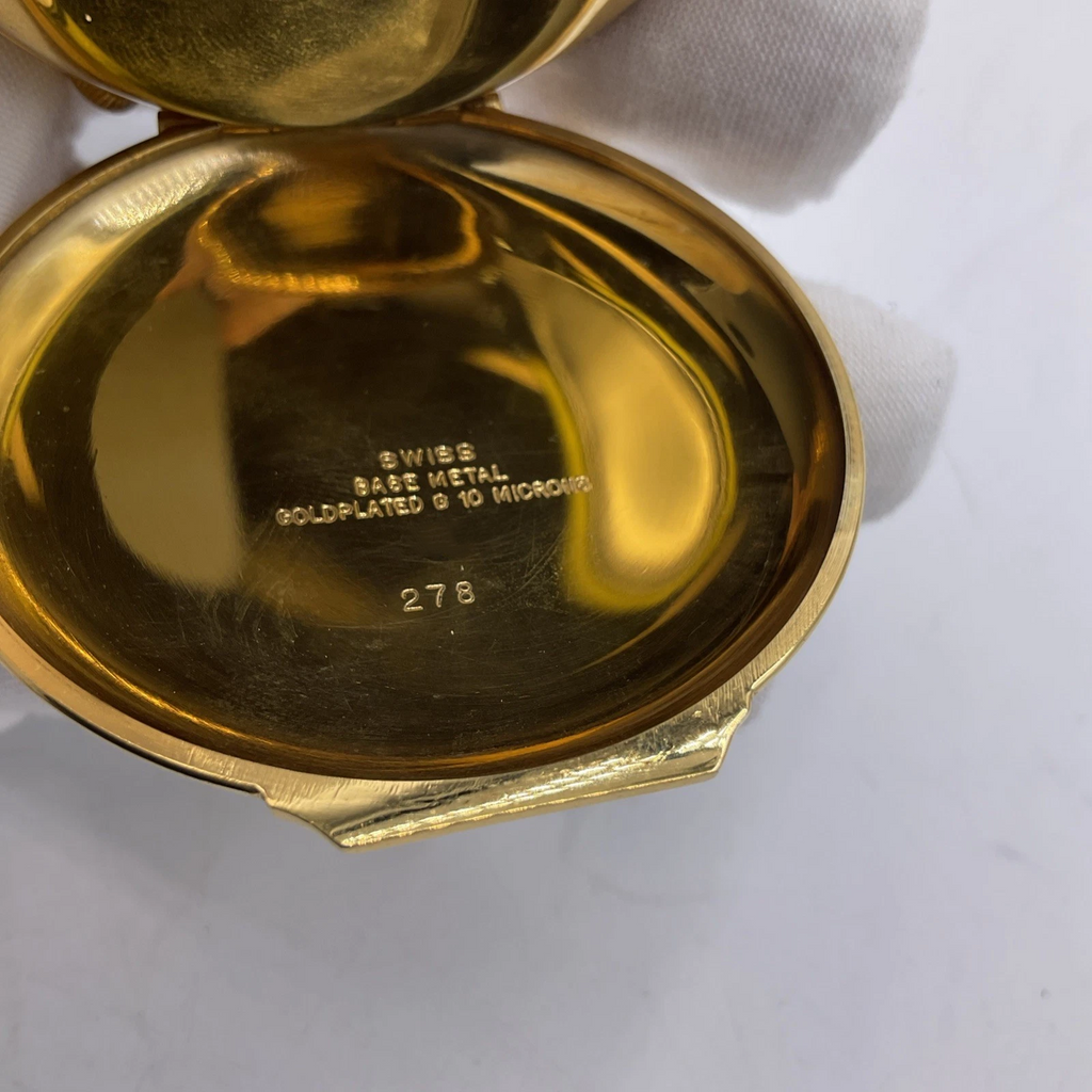 Timeless Treasure: Gold-Tone Musical Pocket Watch