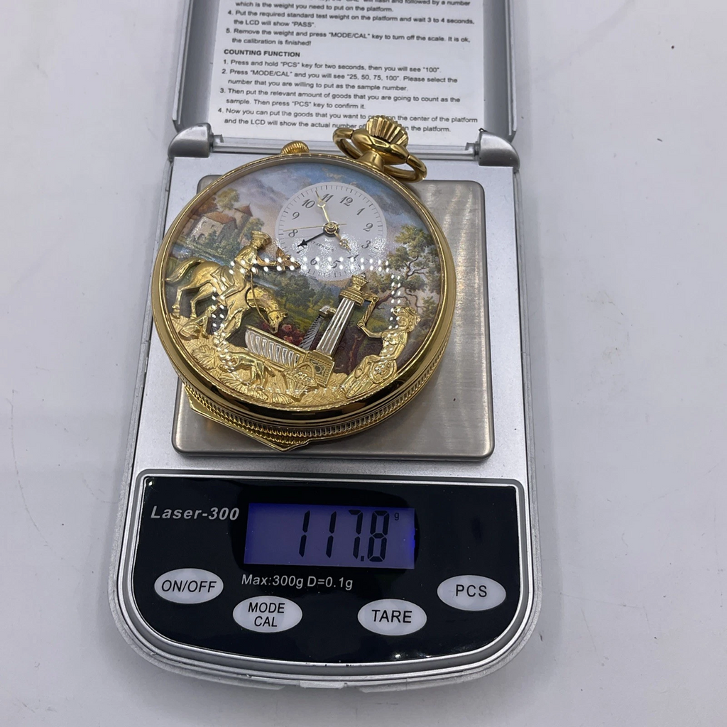 Timeless Treasure: Gold-Tone Musical Pocket Watch